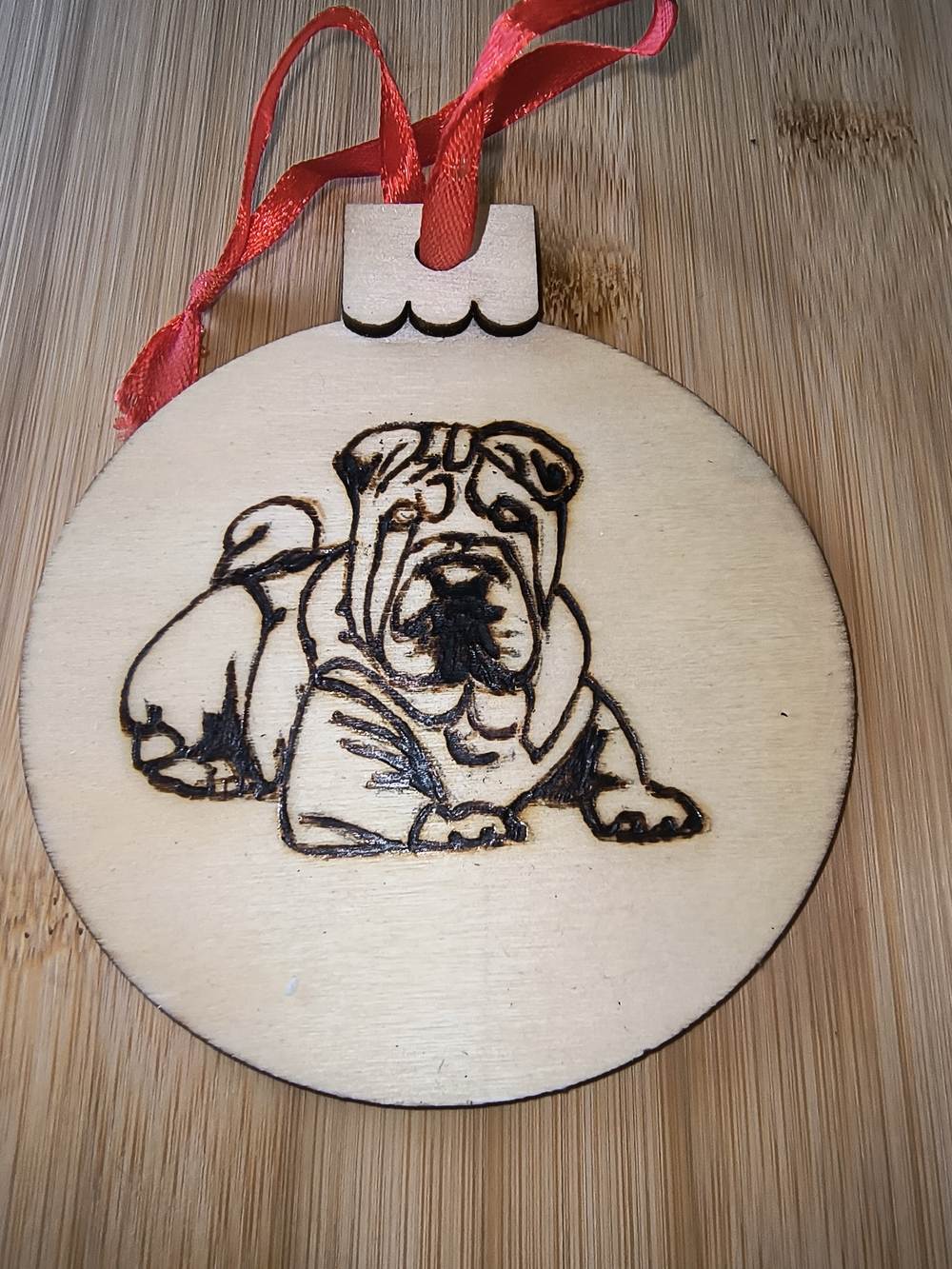 Hand Crafted Wood Bulldog Ornament with Red Ribbon